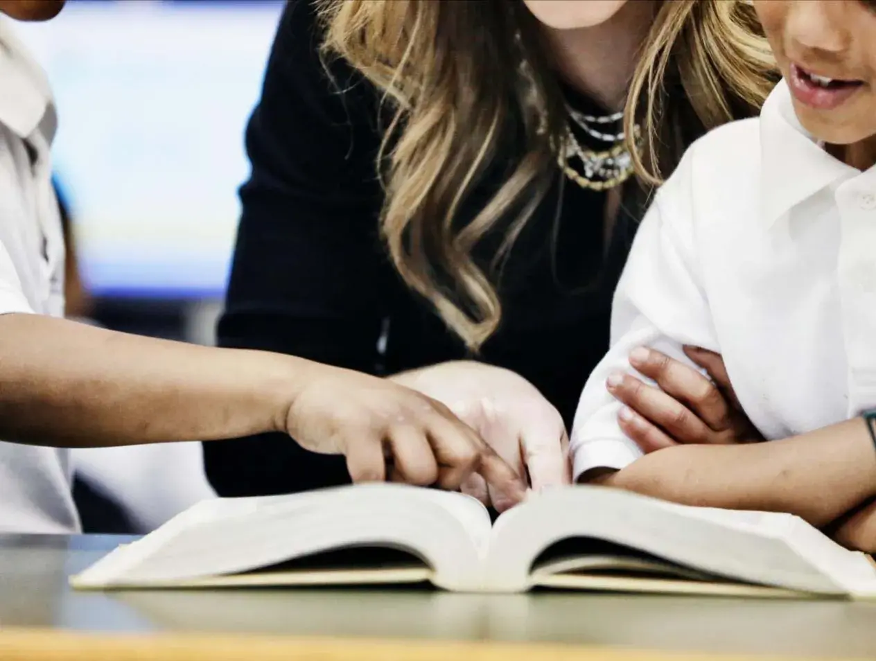 Magis Communities reading book