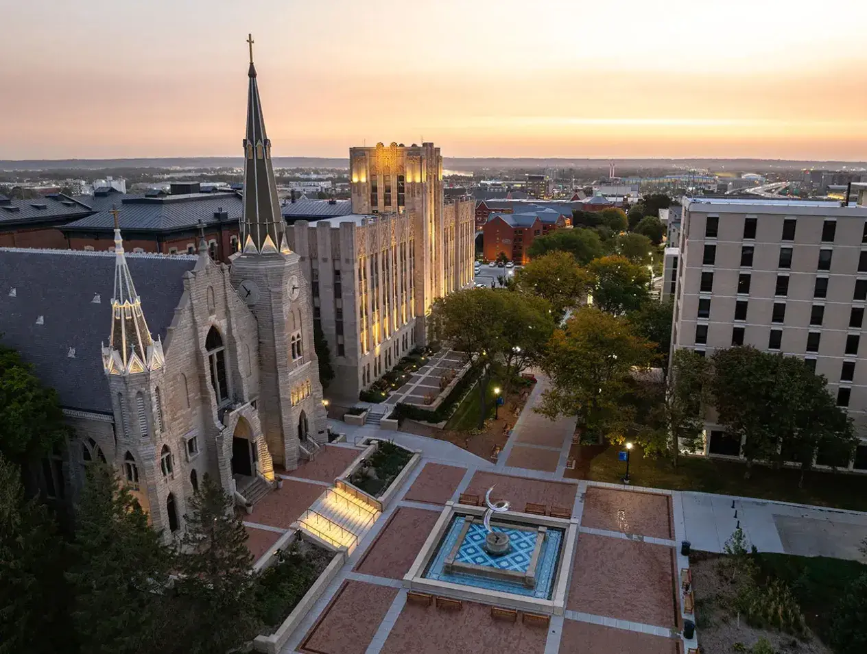 Wide drone shot of Creighton mall outside St. John's church.