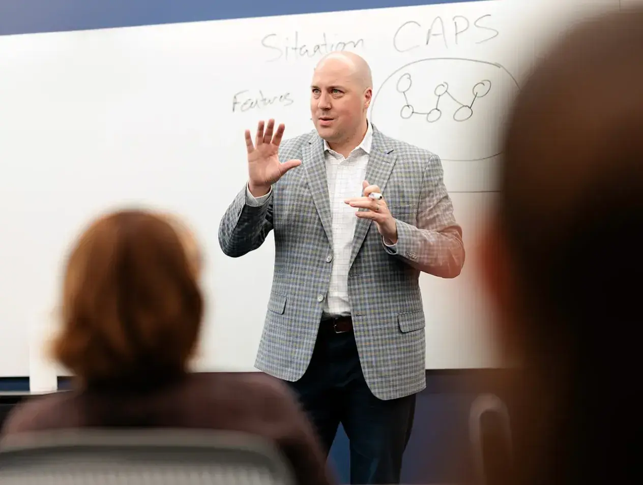 Professor leading class discussion.