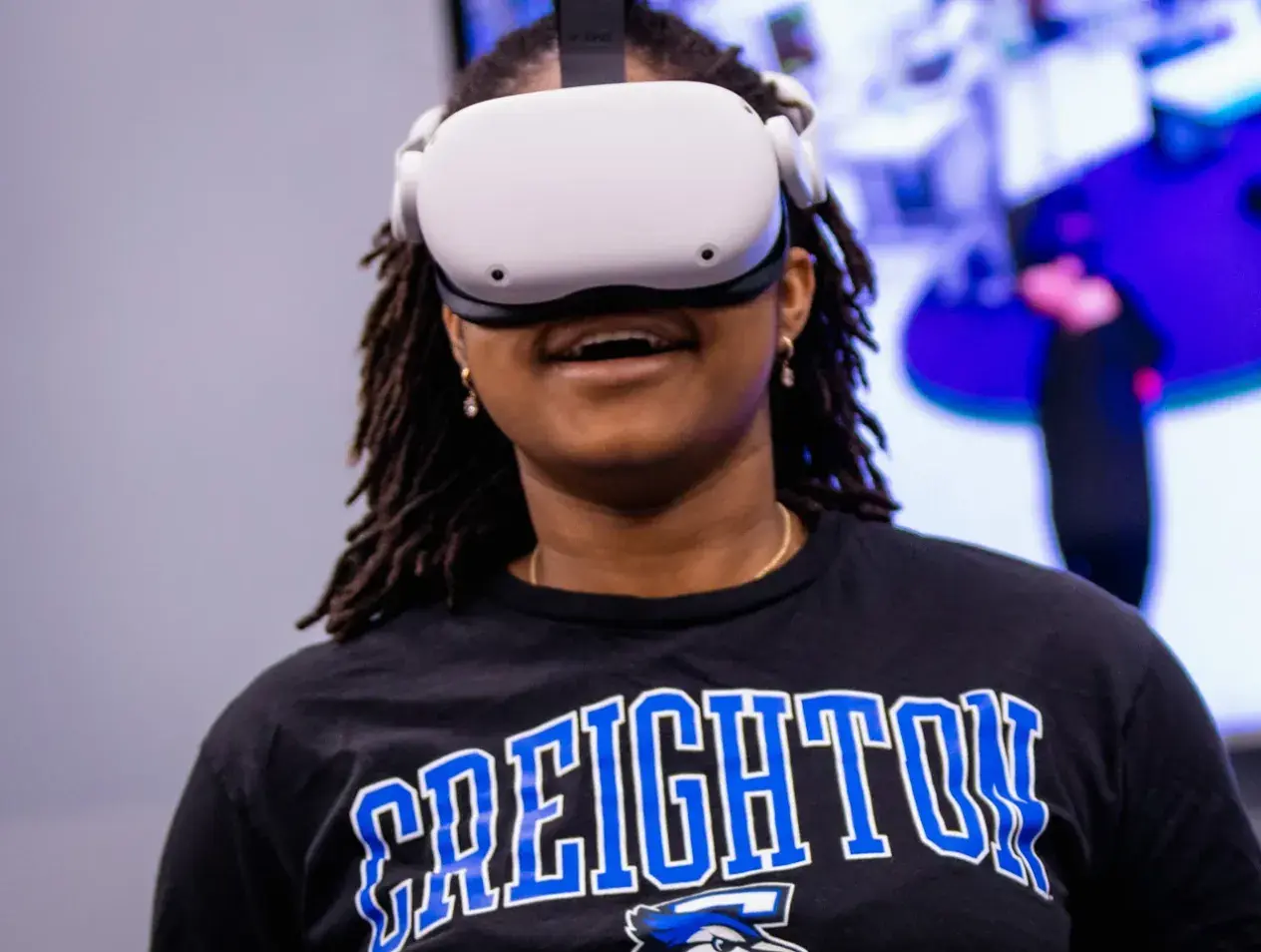 Student using virtual reality headset.