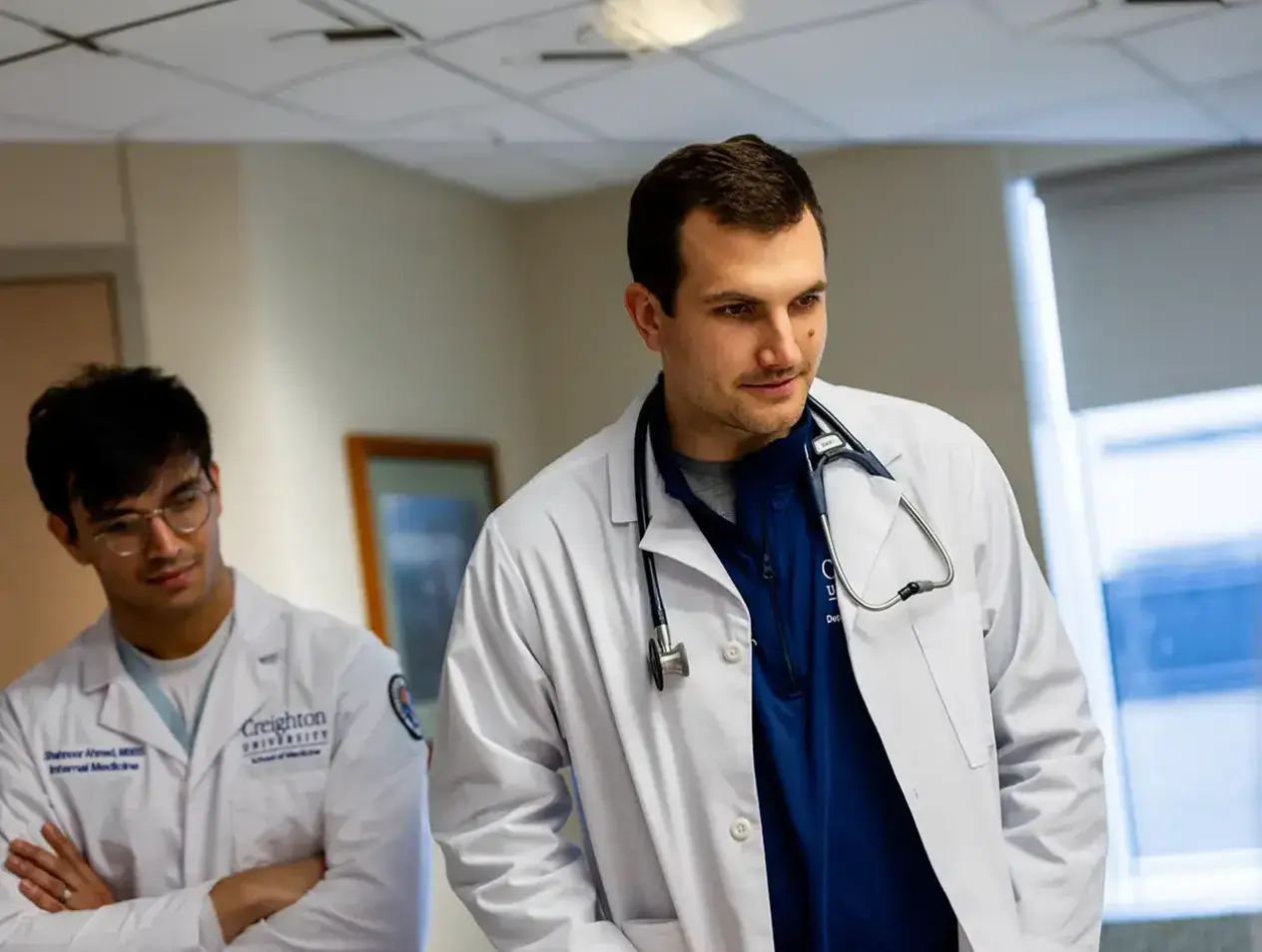 Internal medicine residents in patient room