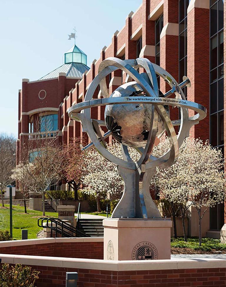 Globe sculpture on Creighton campus
