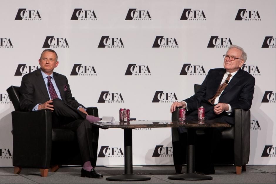 Robert Johnson with Warren Buffett on economic panel