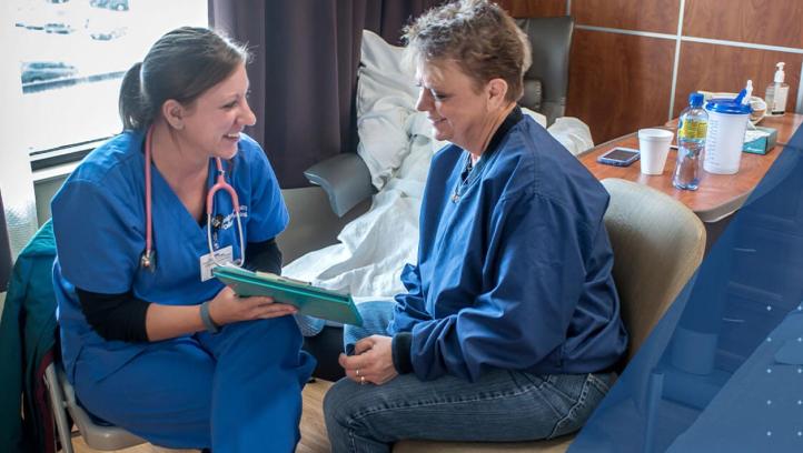 Nurse and patient discussing a plan