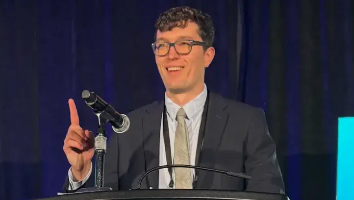Connor Yost speaking at AMA conference in Chicago