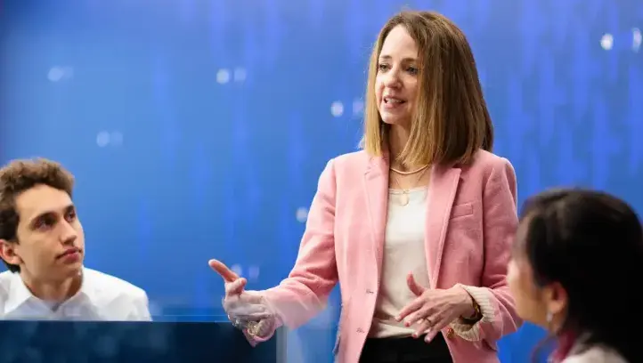 Knight teaches students at Heider College of Business