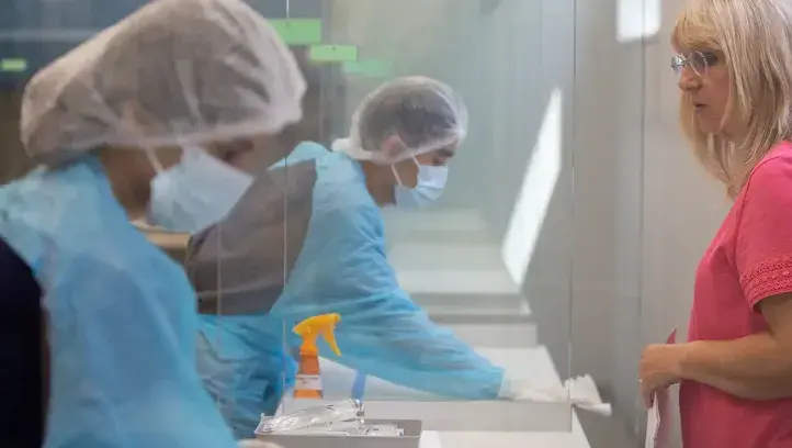 Lab workers in action