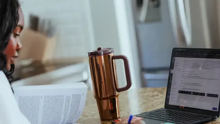 Student studying during online class.
