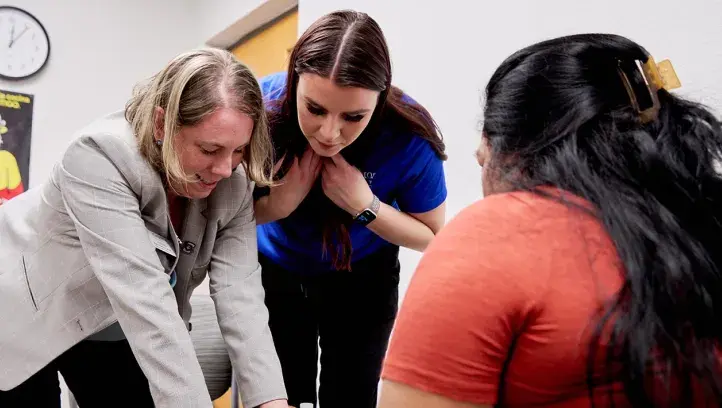 Jessica Goodman, PT, DPT, PhD with student and patient