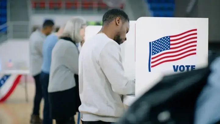 Citizens voting at polling place.