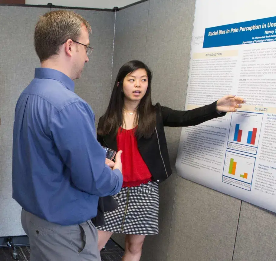 Student presenting research