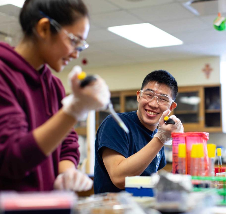 Two students working together in a science lab