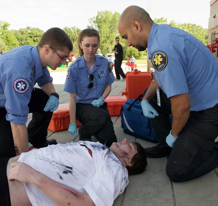 Emergency Medical Services attending to injured person Thumbnail