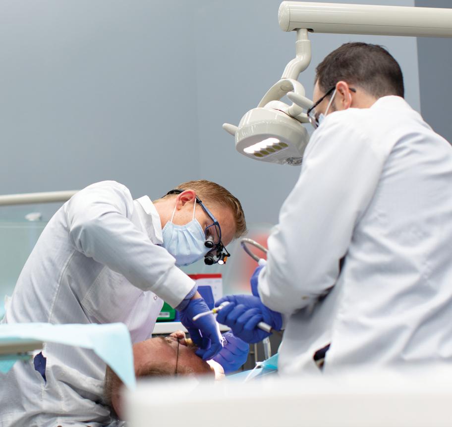 Dentistry students working in Creighton Dental Clinic Thumbnail