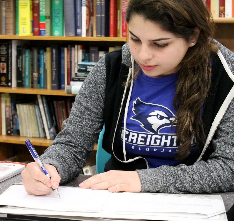 Creighton student studying in library