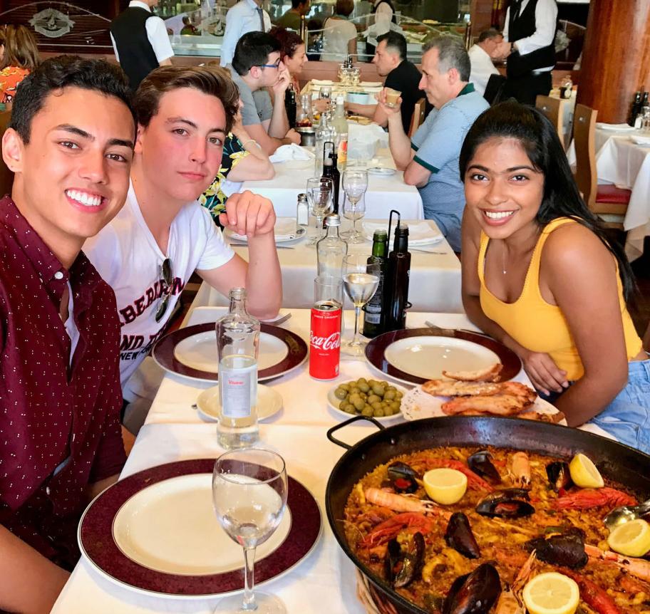 Students celebrating with authentic hispanic cuisine