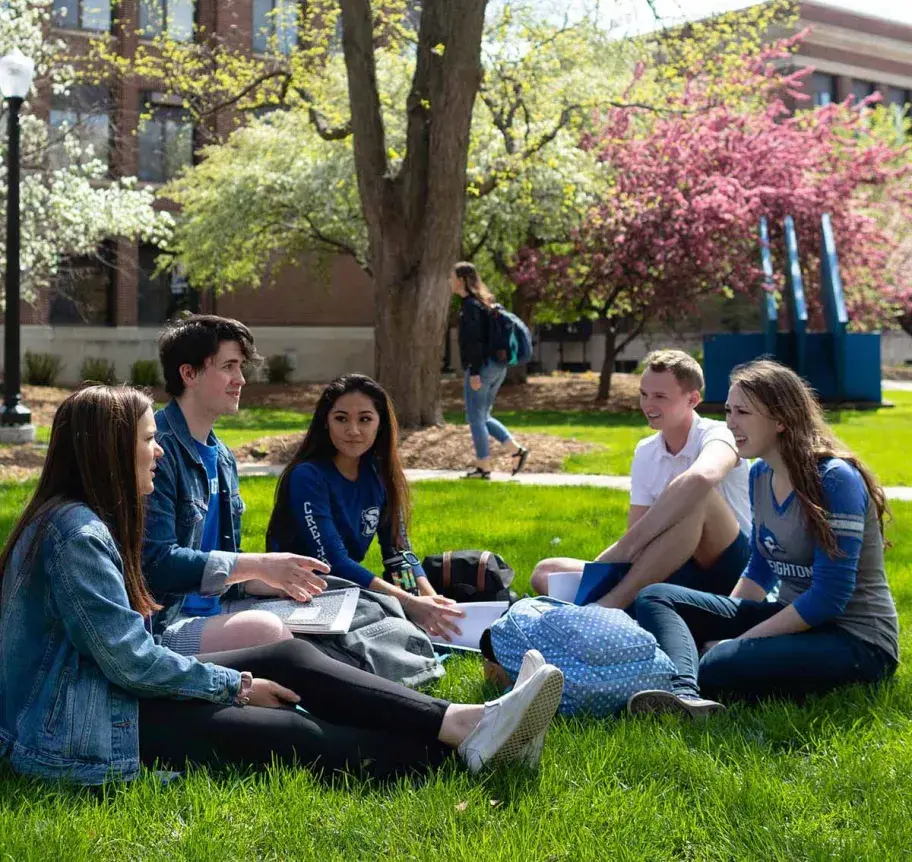 Students gathering outdoors on Creighton campus