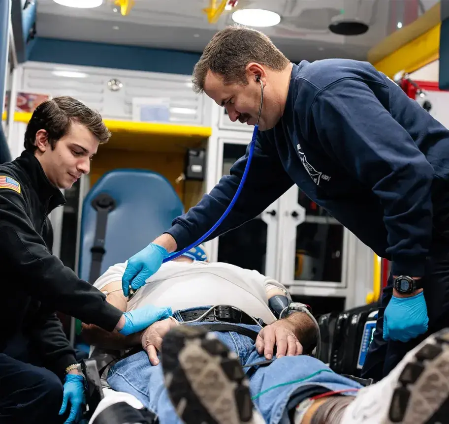 Paramedics working on patient