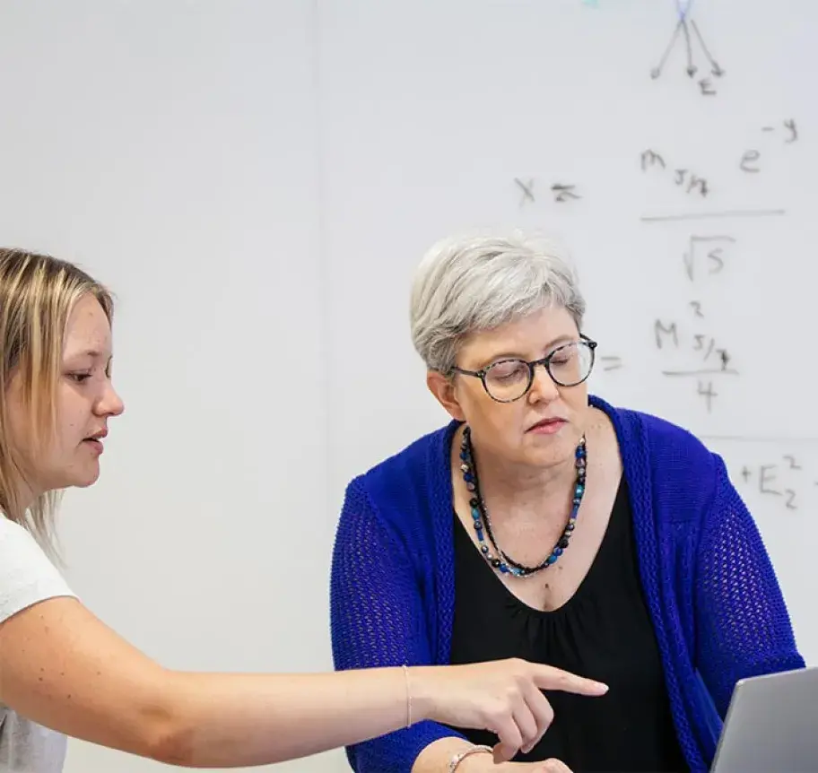 Dr. Seger with Physics grad