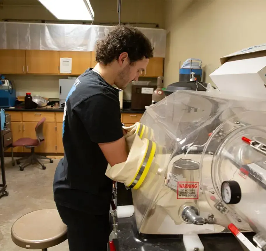 Male student in Physics Lab