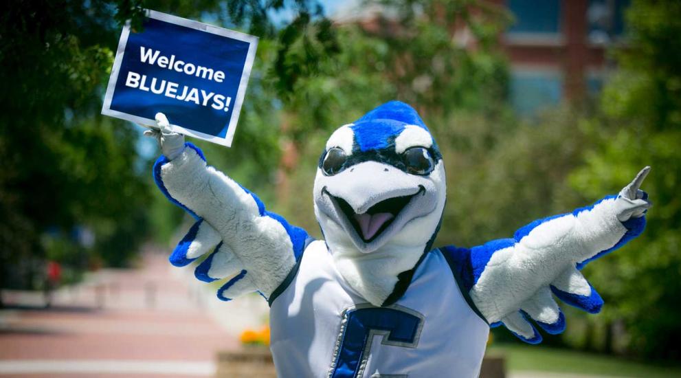 Billy Bluejay welcoming new employees