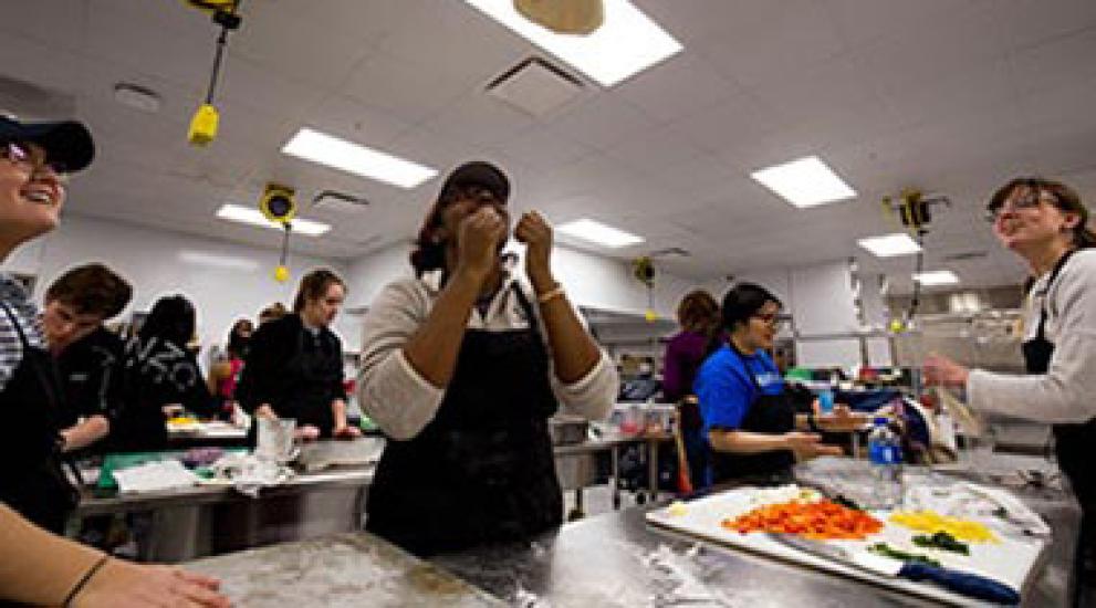 Students preparing food during a class