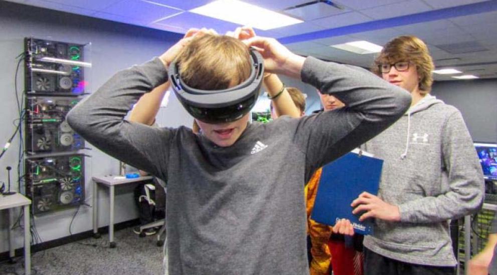 High school student with VR goggles
