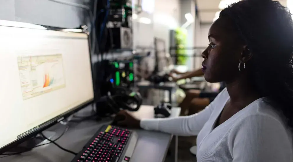 Student working at computer in Radlab