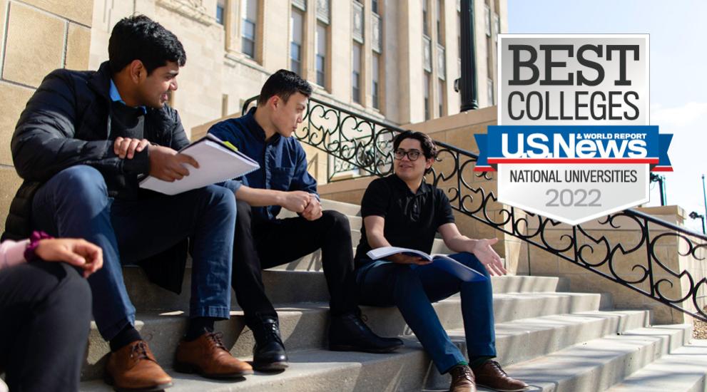 Creighton students studying on building steps with overlay of U.S. News Best Colleges 2022 badge