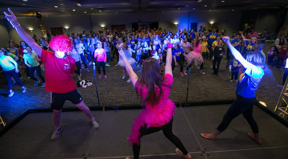 Creighton students dancing to promote helping others.