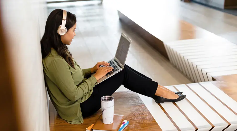 student working on laptop