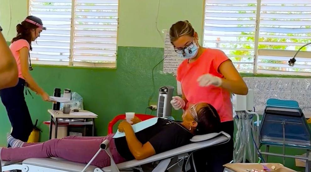 Treating dental patient in Dominican Republic