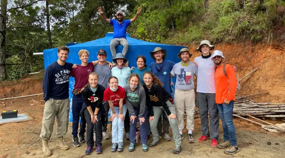 students at an aqueduct