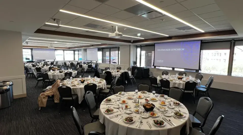 Room with decorated circular tables.