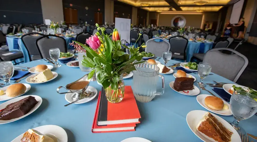 Table setting with flowers and desserts