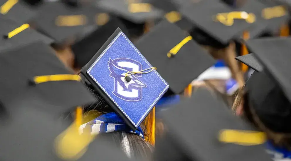 Commencement cap with Bluejay.