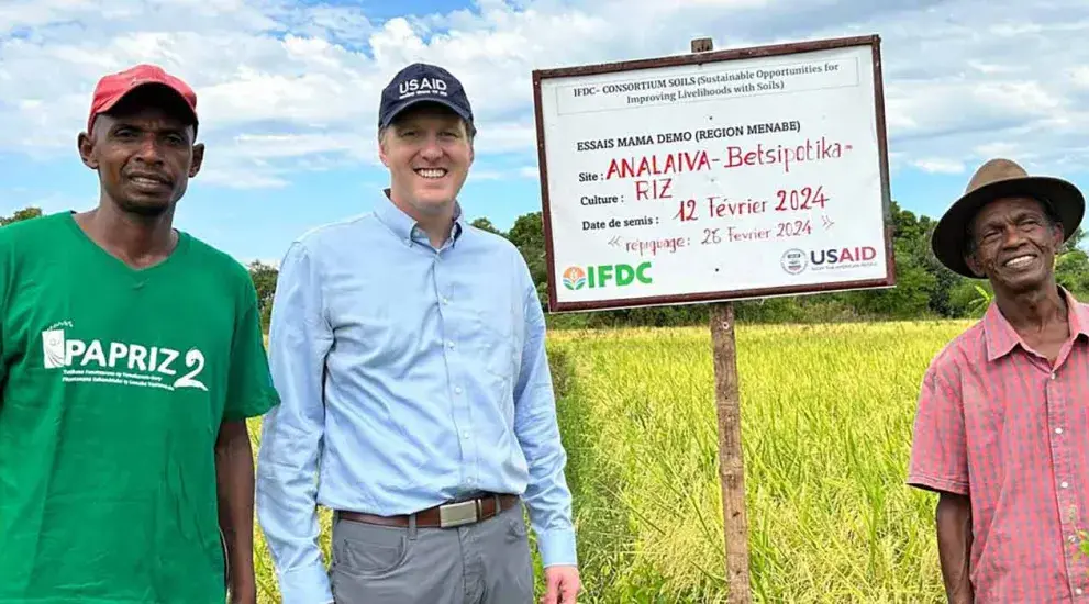 Creighton graduate Zach Stewart with farmers in Madagascar