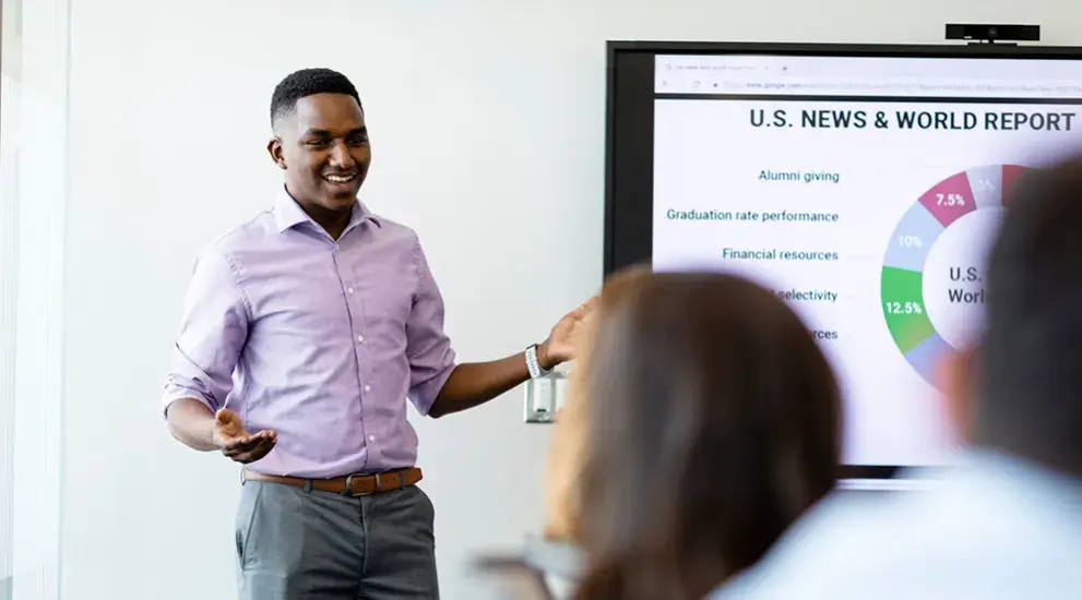 Students collaborating in a conference room