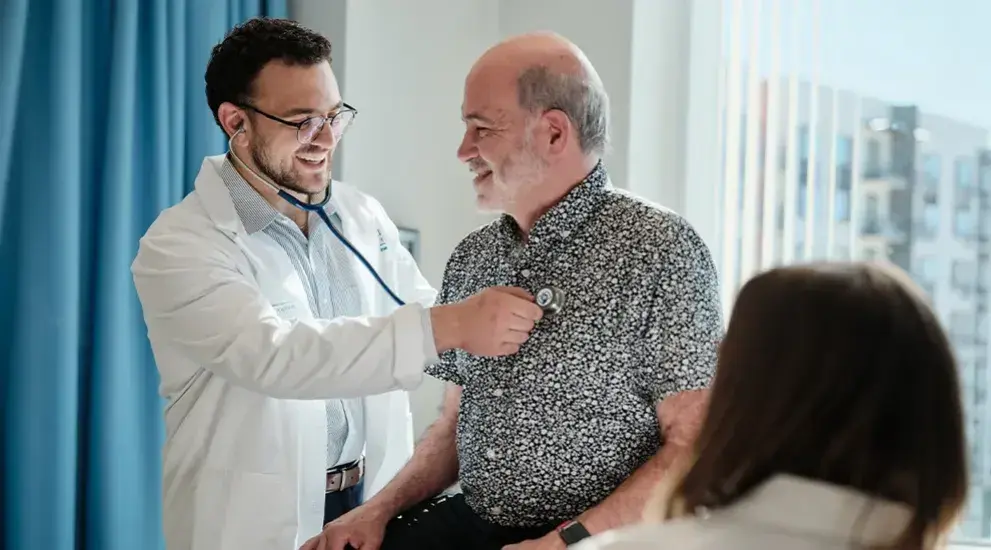 Fellow performing a routine check up