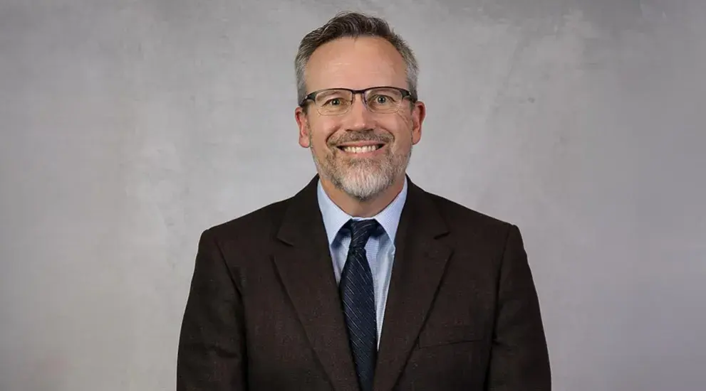 Dr. Mark Hughes