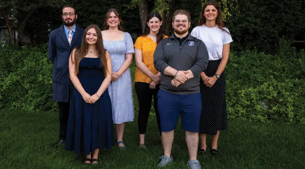 Omahah Magis Community group photo outdoors