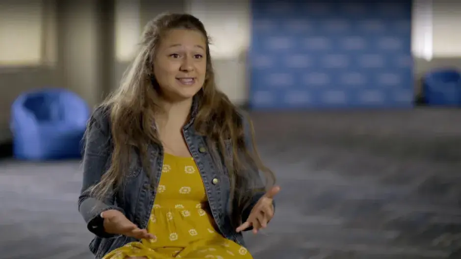 Thumbnail for the Jesuit Educated video featuring a female student giving a testimonial