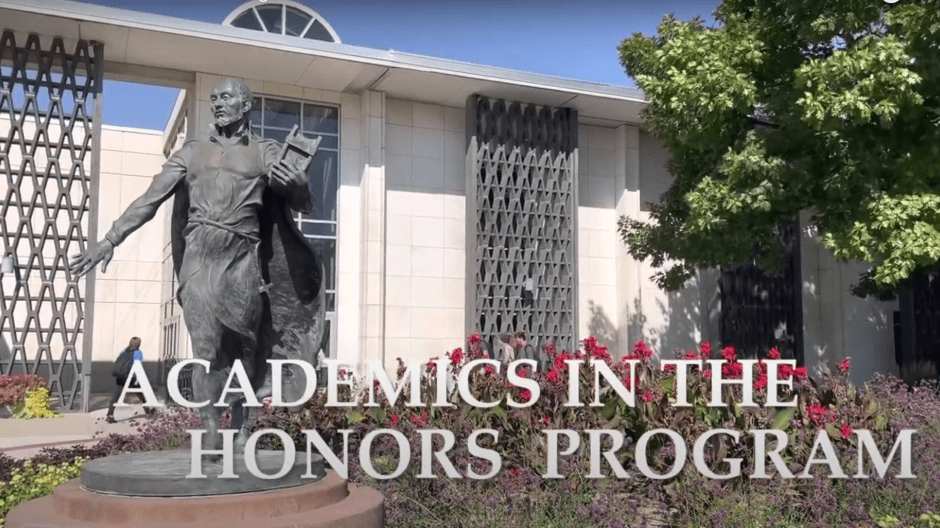 An image of Reinart memorial Library with the words "Academics in the Honors Program" on screen