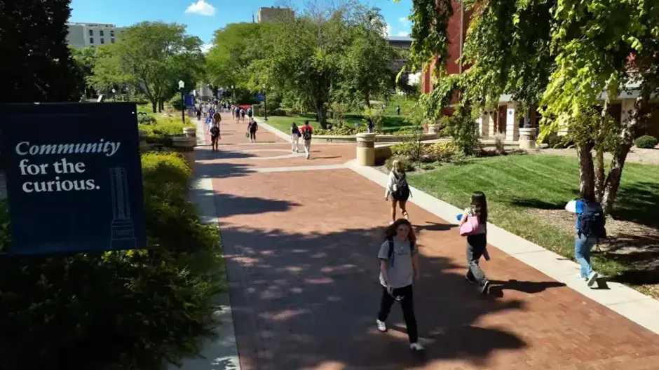Students walking on Creighton campus mall.